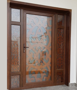 A wooden door with decorative glass panels that enhance the elegance and opulence of entrance door