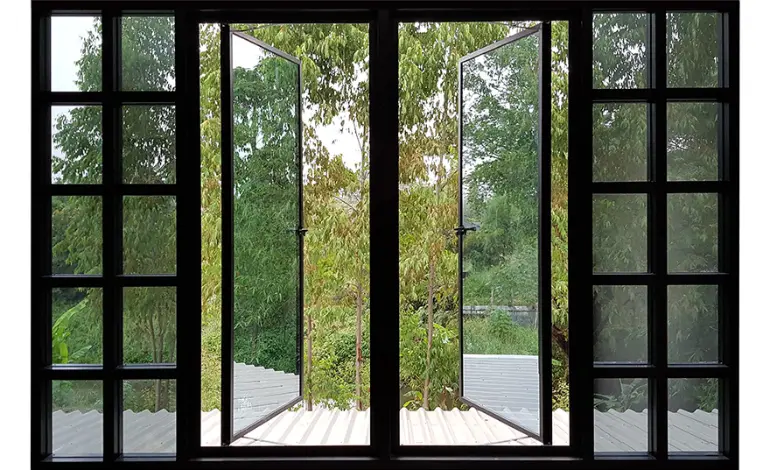 An elegant black glass window highlighting the allure of glass windows and doors